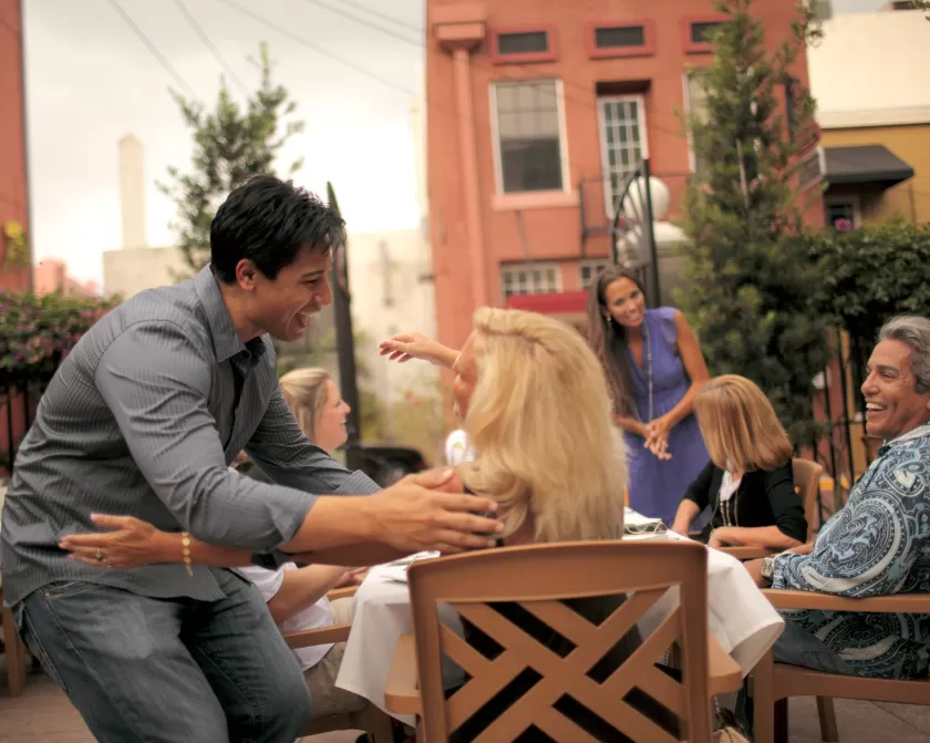 A group of people sitting around a table
